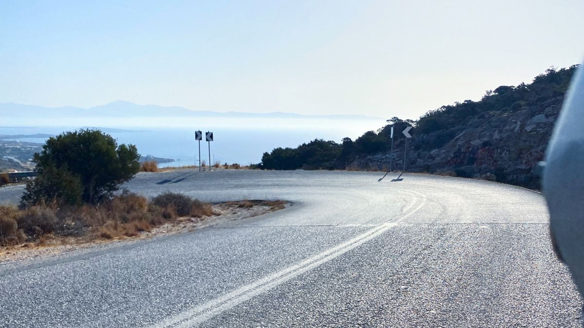 Digital Nomad driving a scooter around Paros Island, Greece